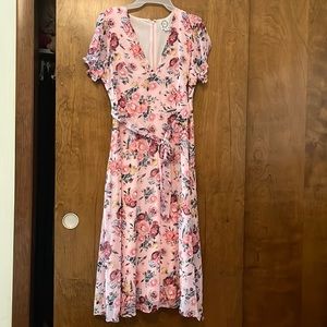 From Francesca’s a pick dress with a floral design